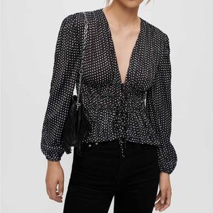 Maje lianito clover polka dot black white ruffled front ties long sleeve blouse